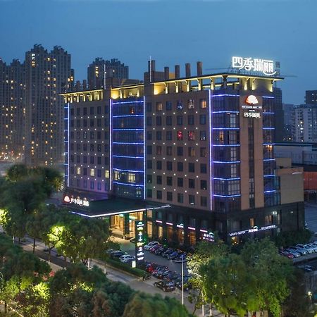 Four Seasons Rayli Hotel Нинбо Екстериор снимка