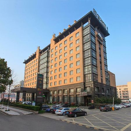 Four Seasons Rayli Hotel Нинбо Екстериор снимка