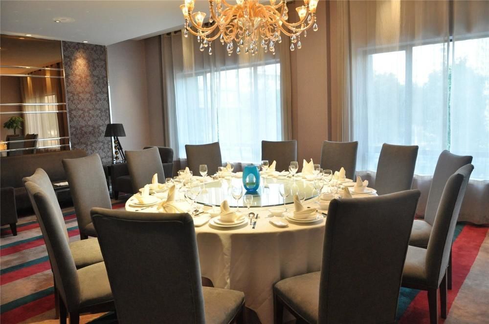 Four Seasons Rayli Hotel Нинбо Екстериор снимка