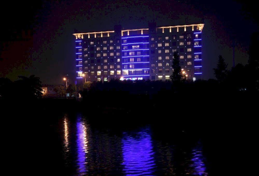 Four Seasons Rayli Hotel Нинбо Екстериор снимка
