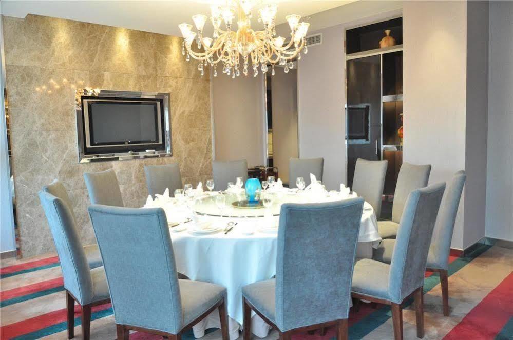 Four Seasons Rayli Hotel Нинбо Екстериор снимка