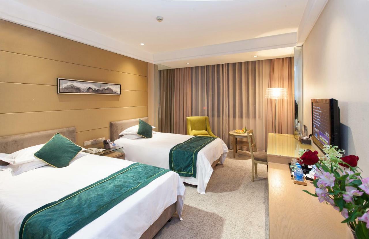 Four Seasons Rayli Hotel Нинбо Екстериор снимка