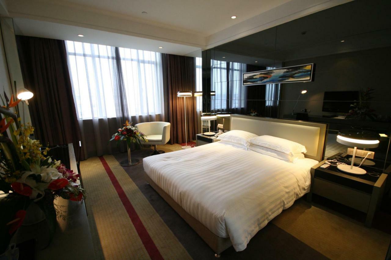 Four Seasons Rayli Hotel Нинбо Екстериор снимка