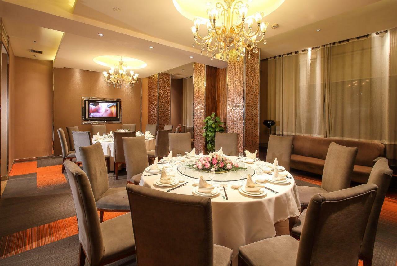 Four Seasons Rayli Hotel Нинбо Екстериор снимка