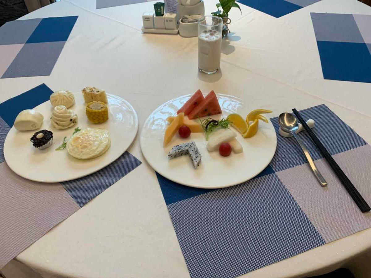Four Seasons Rayli Hotel Нинбо Екстериор снимка