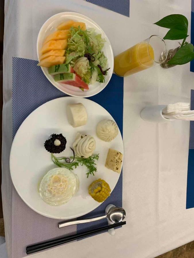 Four Seasons Rayli Hotel Нинбо Екстериор снимка